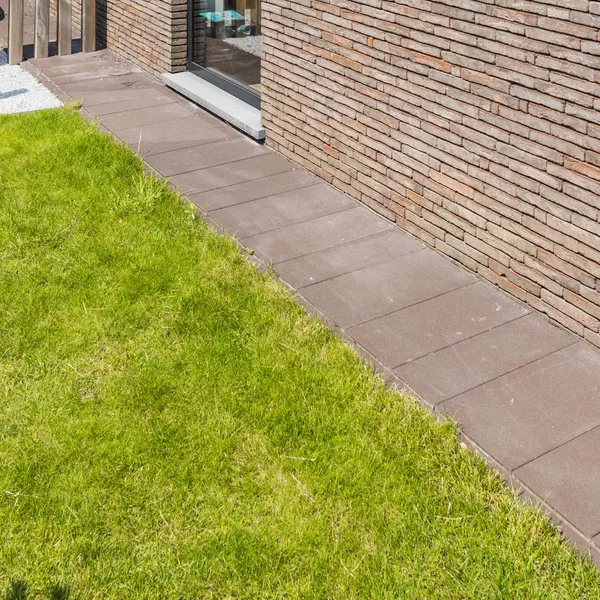 Application image for Uitnodigende en warme inrit dankzij Mega Linea-XXL